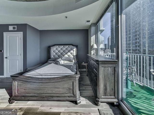 bedroom featuring light hardwood / wood-style flooring