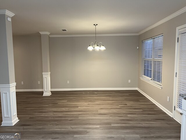 interior space with ornamental molding, ornate columns, and dark wood-type flooring