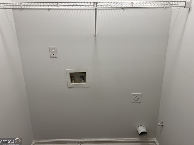 laundry area with electric dryer hookup and washer hookup