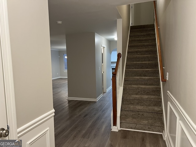 stairway featuring hardwood / wood-style flooring