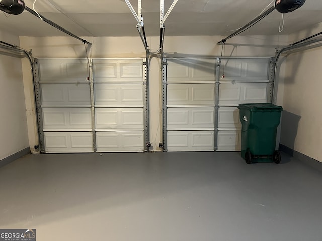 garage featuring a garage door opener