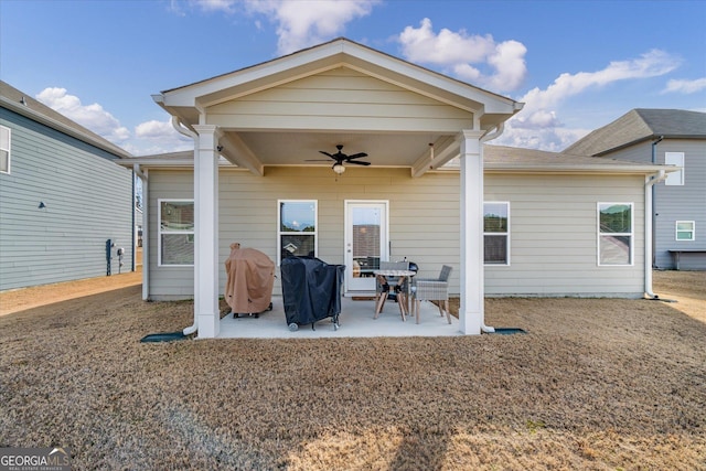 back of house featuring ceiling fan and a patio