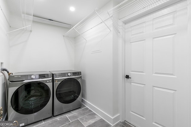 laundry room with washer and dryer