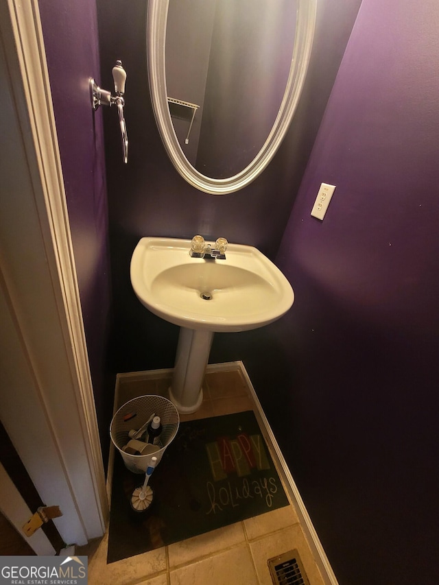 bathroom featuring tile patterned flooring