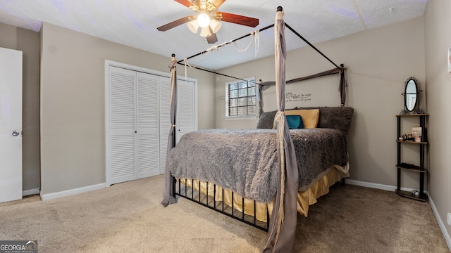 bedroom featuring carpet flooring, ceiling fan, and a closet