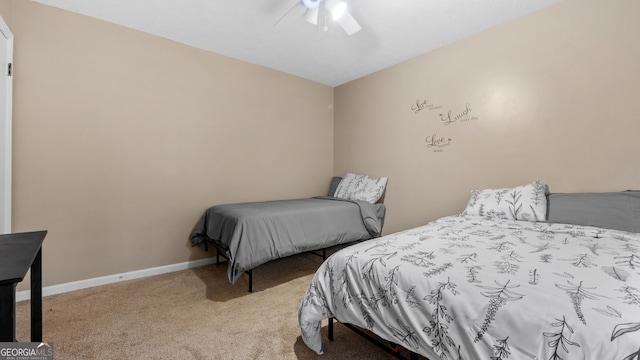 bedroom with light carpet and ceiling fan