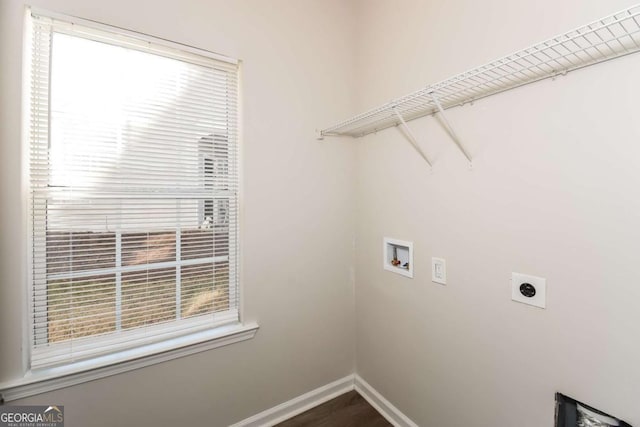 clothes washing area with electric dryer hookup and hookup for a washing machine