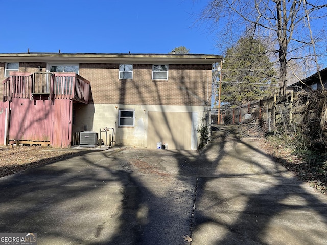 view of side of property featuring cooling unit