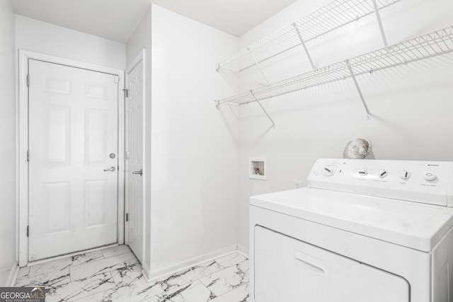 clothes washing area featuring washer / clothes dryer