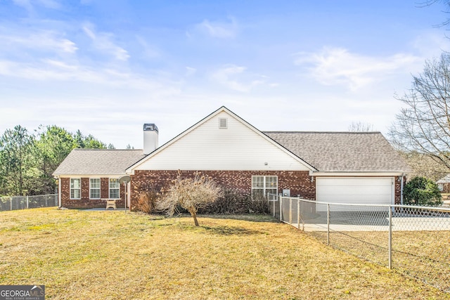 single story home with a garage and a front lawn