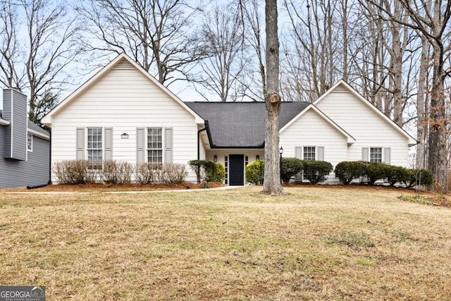 single story home featuring a front yard