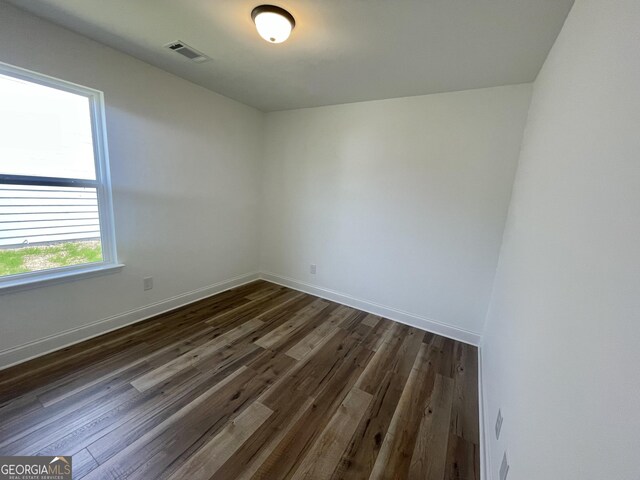 bathroom with hardwood / wood-style flooring and vanity