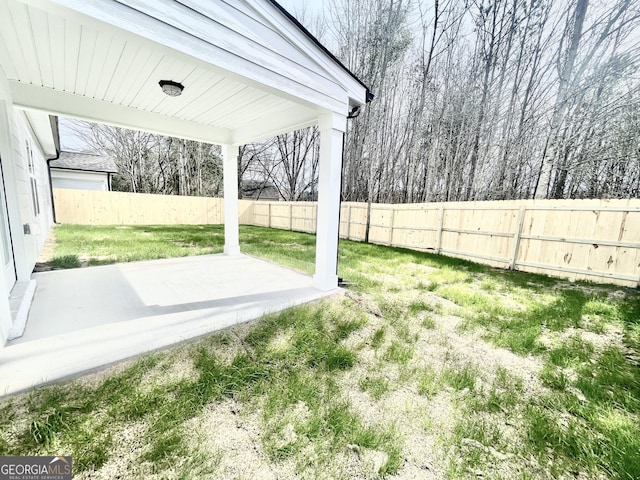 view of yard featuring a fenced backyard and a patio