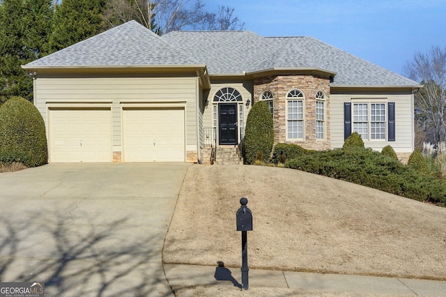 ranch-style home with a garage