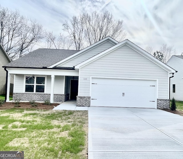 single story home featuring a garage, driveway, stone siding, roof with shingles, and a porch