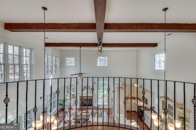 hallway with beamed ceiling