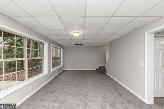 interior space featuring a paneled ceiling