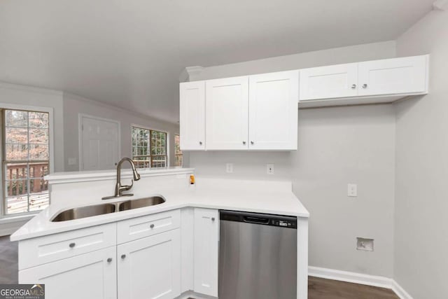 kitchen featuring sink, white cabinets, and dishwasher