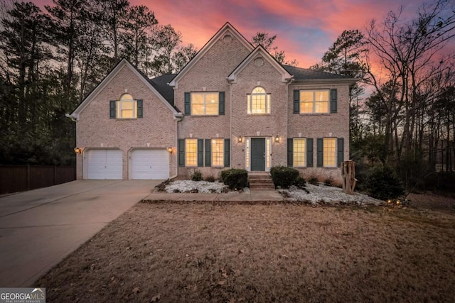 colonial home featuring a garage