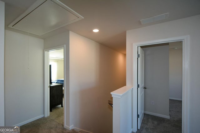 corridor with carpet floors