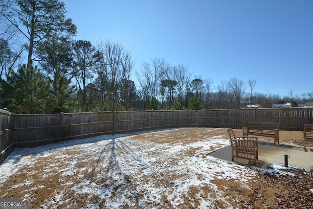 view of yard covered in snow