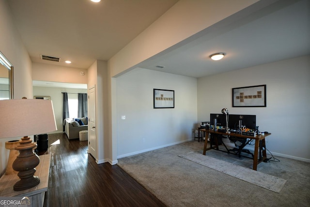 home office with dark carpet