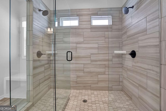 bathroom featuring an enclosed shower