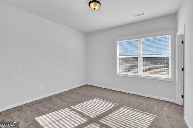 view of carpeted spare room