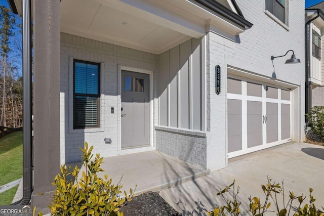 entrance to property featuring a garage