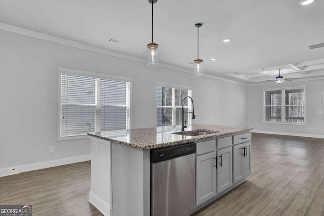 kitchen with beamed ceiling, dishwasher, coffered ceiling, a kitchen island with sink, and sink