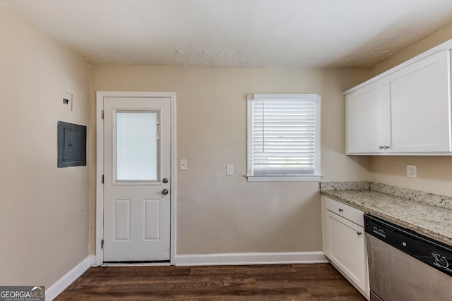 kitchen featuring light stone countertops, white cabinets, dishwasher, and electric panel