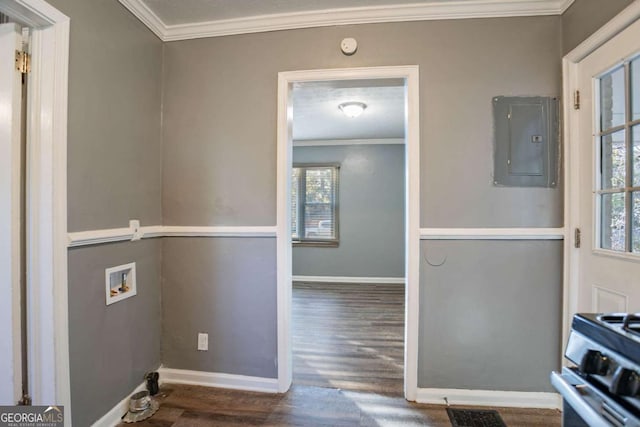 interior space featuring a wealth of natural light, electric panel, and ornamental molding