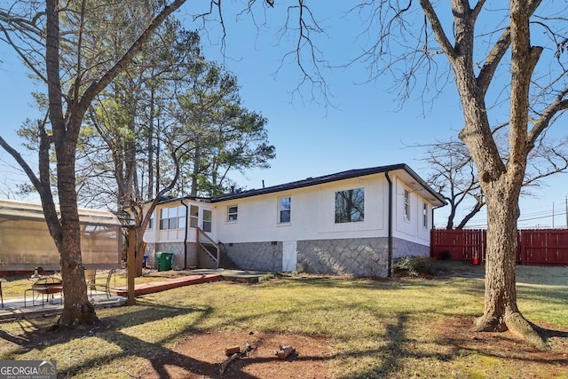 exterior space featuring a yard