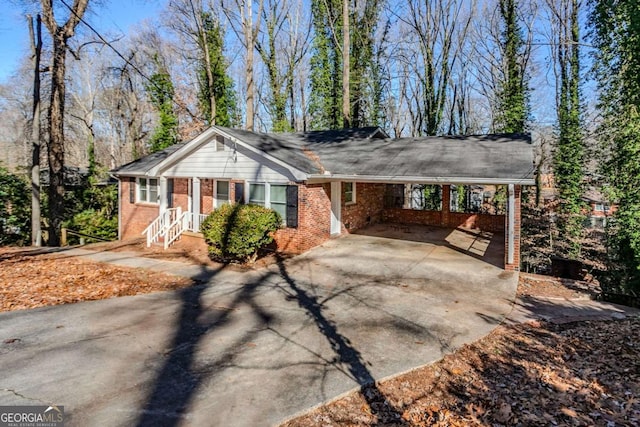 single story home with a carport