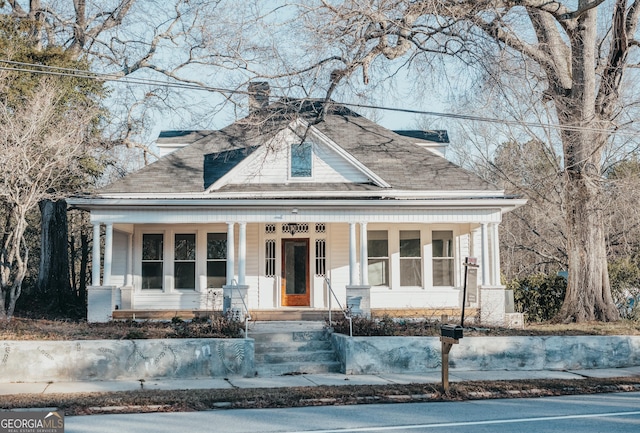 view of front of property featuring covered porch