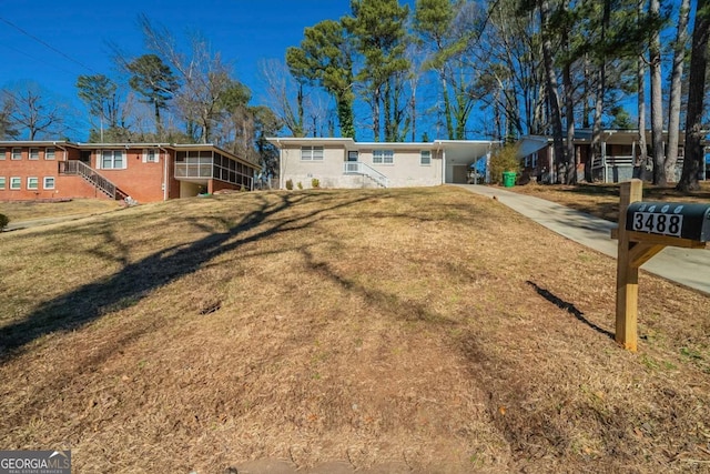 exterior space with a yard