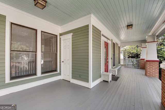 wooden deck with a porch