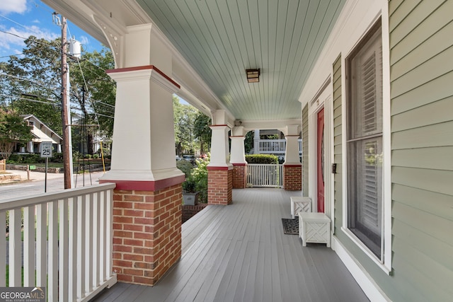 deck with covered porch