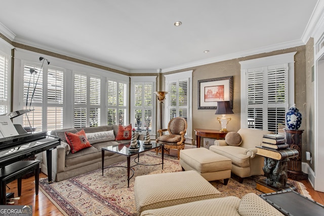 living room featuring crown molding and light wood-type flooring