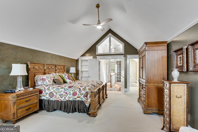 carpeted bedroom featuring vaulted ceiling and ceiling fan