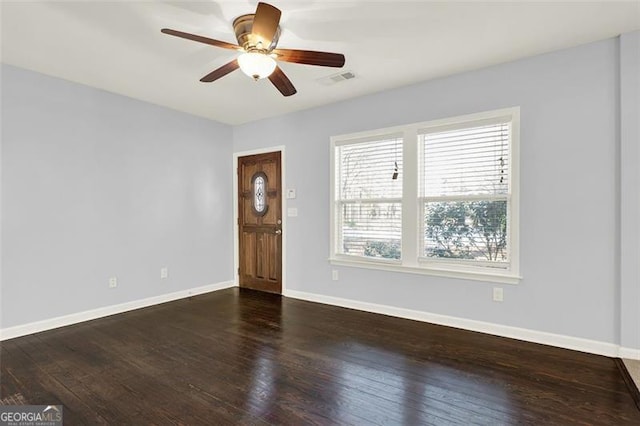 entryway with ceiling fan and dark hardwood / wood-style floors