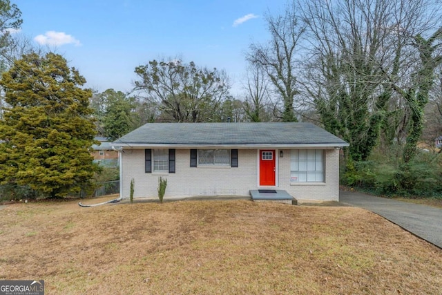 ranch-style house with a front yard