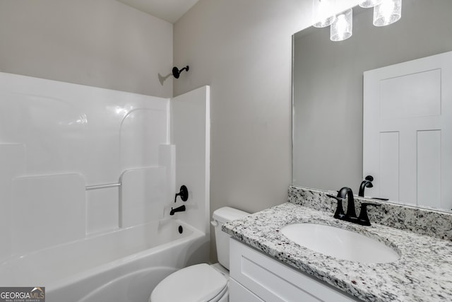 full bathroom featuring vanity, tub / shower combination, and toilet