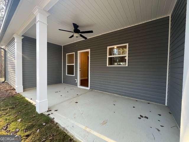 view of patio / terrace featuring ceiling fan