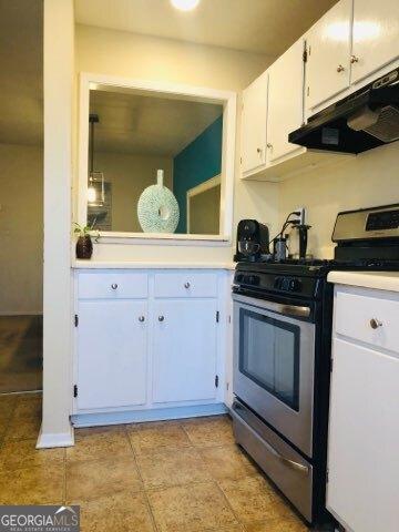 kitchen with white cabinetry and stainless steel gas stove