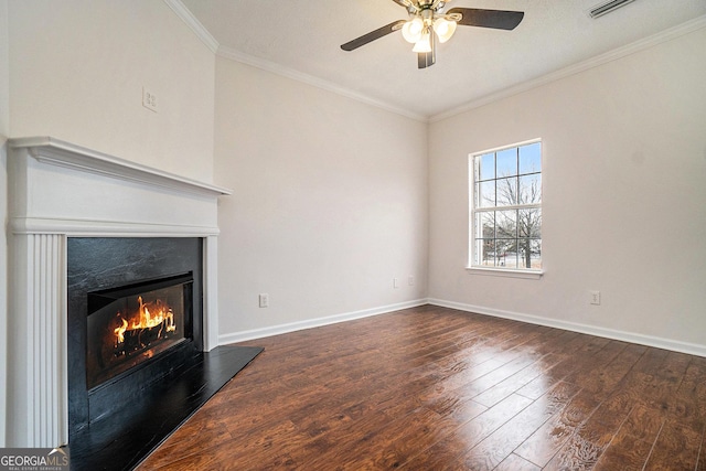 unfurnished living room with dark hardwood / wood-style flooring, crown molding, and ceiling fan