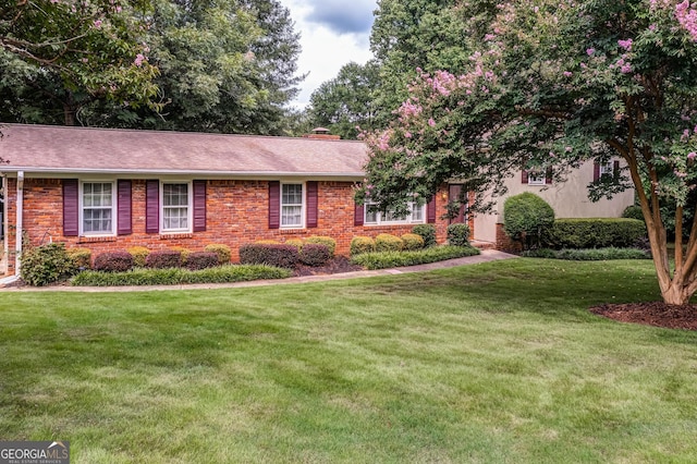 view of front of home with a front yard