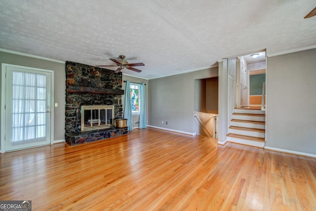 3170 Ebenezer Rd, Marietta, GA 30066 - unfurnished living room with a ceiling fan, wood finished floors, crown molding, a textured ceiling, and baseboards