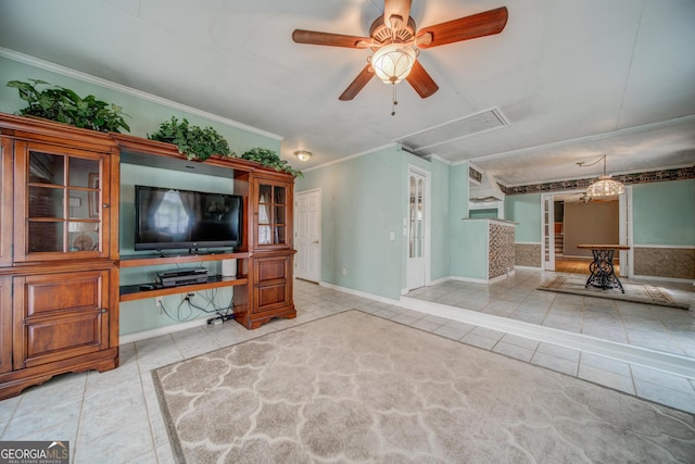 unfurnished living room with ornamental molding, light tile patterned floors, and ceiling fan