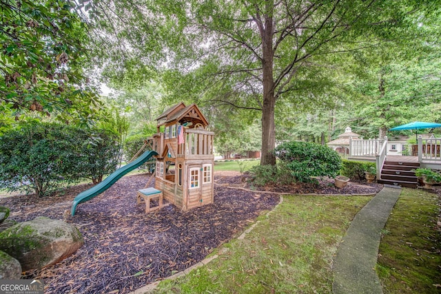 view of play area featuring a deck